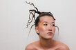 © Liliya Rodnikova/Stocksy - Asian woman unusual beauty portrait