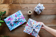 © Mal de Ojo Studio/Stocksy - Sustainable fabric gift wrapping
