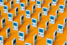 8-bit Handheld Game Console In Different Positions