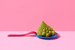 © Juan Moyano/Stocksy - baby romanesco broccoli in a blue plate and fork