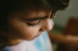 © Maria Manco/Stocksy - Profile view of a young boy with long eyelashes