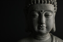 Beautiful Stone Buddha Sculpture On Black Background, Closeup. Space For Text
