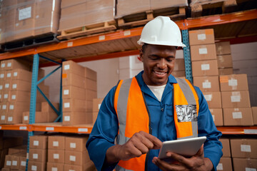 Wall Mural - Portrait of a warehouse manager keeping stock records using digital tablet