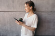© Sergey Filimonov/Stocksy - Confident woman with smartphone
