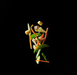 © Darren Muir/Stocksy - Stir fry flying vegetables