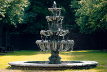 Stone Water Fountain In The Park