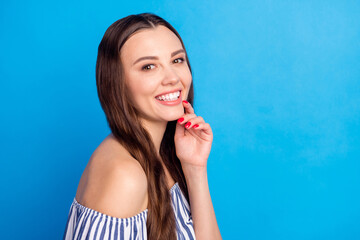 Poster - Photo portrait woman pretty beautiful touching chin smiling happy isolated vibrant blue color background