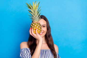 Poster - Photo of charming pretty young woman dressed striped outfit fruit cover eye smiling isolated blue color background