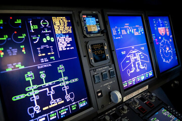 A typical dashboard panel in the cockpit of a private jet plane aircraft. 