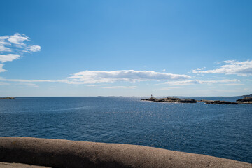 the beautiful coast of norway with its rock formations and blue water on a beautiful summer day