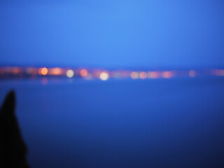 Defocused blur lights of twilight scape