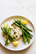 © Nadine Greeff/Stocksy - Fish with asparagus and potato