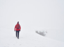 Walking In Heavy Snow On Wild Boar Fell, Cumbria, UK.
