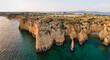 © Anna Berkut/Stocksy - panorama  of coastline at Ponta da Piedade, Lagos, Algarve in Portugal