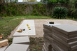 © Gabriel (Gabi) Bucataru/Stocksy - New patio construction in a back yard