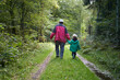 © PER Images/Stocksy - Family walk in forest