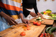 © Luis Velasco/Stocksy - Couple Cooking At Home.