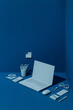 © Marc Bordons/Stocksy - top view of a work corner in blue tones.