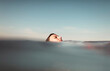 © Ibai Acevedo/Stocksy - Girl head on the sea surface