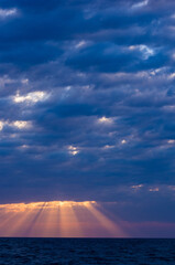 Wall Mural - Amazing sea sunset, the sun, waves, clouds