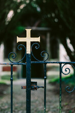 Cross On The Gate Of A Church