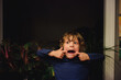 © Cameron Whitman/Stocksy - Young boy making a face