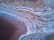 © INIGO CIA DA RIVA/Stocksy - Colorful abstract background of pink salt lake