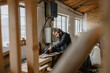 © Gabriel (Gabi) Bucataru/Stocksy - Male sanding a piece of wood in a shop