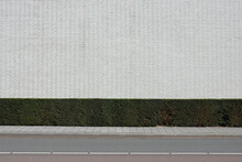White Wall With Hedge