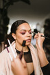 © Mal de Ojo Studio/Stocksy - Woman getting her makeup done
