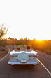 © Raymond Forbes Photography/Stocksy - Road Trip in Vintage Car on Remote Road