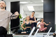 © Studio Firma/Stocksy - People in Pilates Class