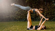 © Soledad Kubat/Stocksy - Two women doing an acroyoga pose