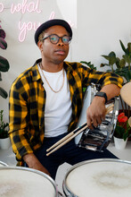 Black Man With Drums And Drumsticks