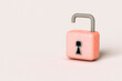 © Giada Canu/Stocksy - Pink padlocks on grey background