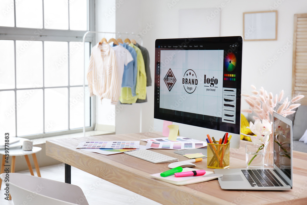 Comfortable workplace of graphic designer in office