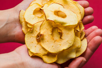 Poster - Top view handful of round dried slices of apple