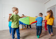 © oksix - Dynamic and team building games for kids with colorful canopy