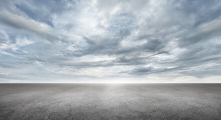 Wall Mural - Dramatic Sky Background with Dark Clouds Empty Concrete Floor