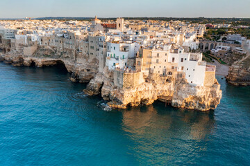 Wall Mural - Aerial view of a sunset of Polignano by sea in Bari. A village by the sea in Puglia. Wonderful landscape