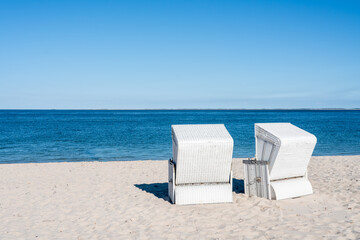 Wall Mural - summer vacation in a beach chair at the beach