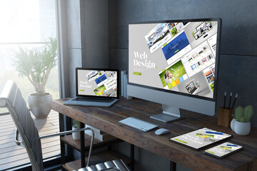 Wall Mural - Responsive devices on wooden desktop