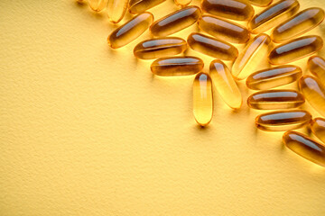 Wall Mural - Omega-3 Fish Fat Oil Capsules. Fish oil capsules isolated on white background. Close up of capsules Omega 3 on white background. Health care concept. Nutritional supplements. Vitamins