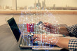 © peshkova - Double exposure of man hands typing on computer with credit card and brain theme drawing. E-commerce and AI concept.