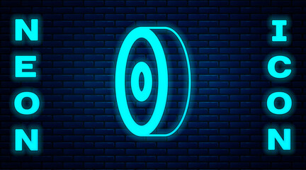 Poster - Glowing neon Skateboard ball bearing icon isolated on brick wall background. Vector