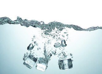 Wall Mural - blue water surface with splash air bubbles and ice cubes