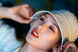 © Pansfun Images/Stocksy - portrait of fashion Asian woman with hat