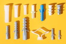 Set Of Dowels On Yellow Background With Shades