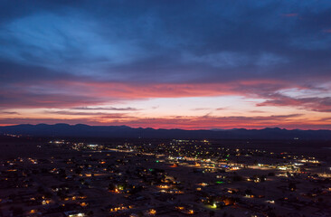 Wall Mural - Colorful sunset over a city