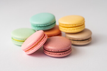 colorful macarons on white background